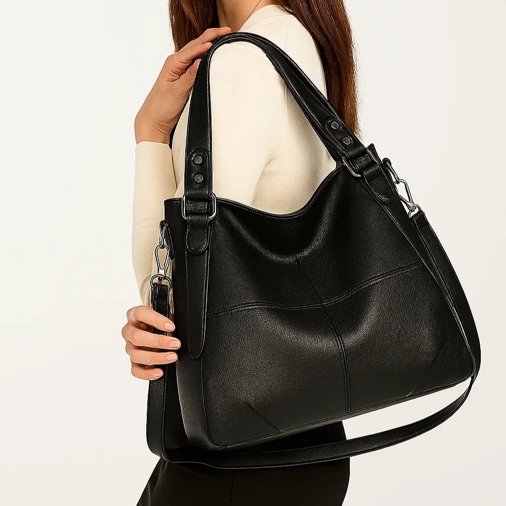 Model holding the Atis leather bag